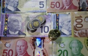 ژئوپلیتیک و بانک کانادا برای تعیین قیمت دلار/کادر کانادا