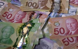 نرخ USD/CAD در ماه مارس در آستانه گزارش اشتغال کانادا کاهش یافت