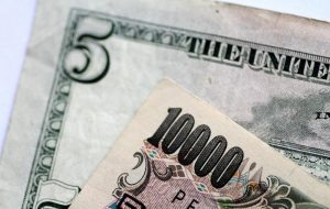 کاهش دلار، ین به تصمیم بانک ژاپن توسط Investing.com واکنش نشان داد