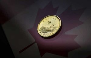 افزایش دلار کانادا در حالی که سرمایه گذاران تحریم های روسیه را تحت فشار قرار می دهند