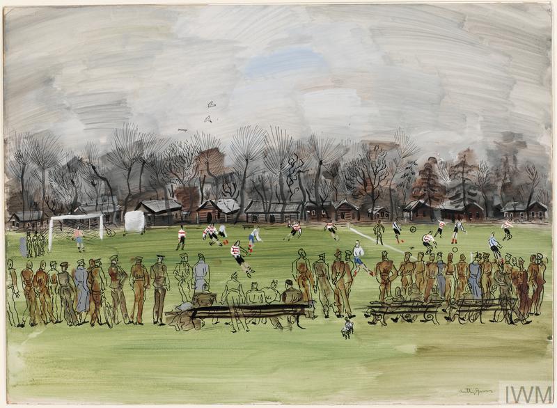 A winter's day; a football match in an open field, with cricket screen, trees and buildings behind. A line of soldiers, some wearing grey coats, watches from the near touchline. A few are seated on benches.