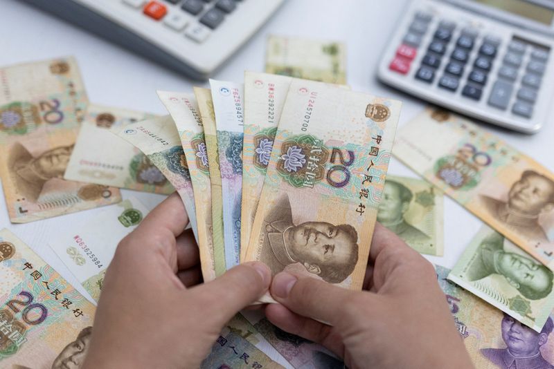 چین برای مقاومت در برابر دلار در برابر ترفندهای یوان عمیقاً حفاری می کند