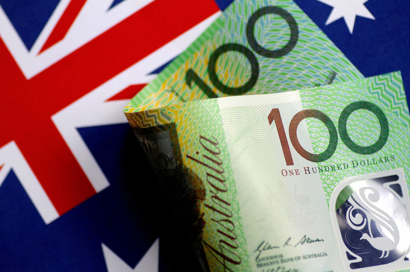 Asia FX slips as Fed hike approaches, Aussie slides on weak CPI