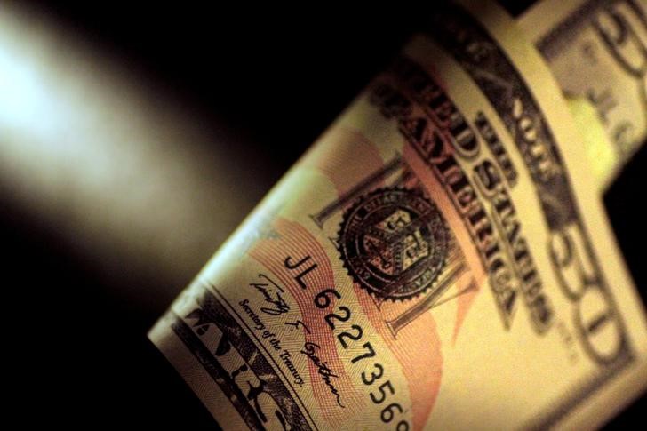 Dollar gains on strong jobs data; Sterling awaits BOE meeting