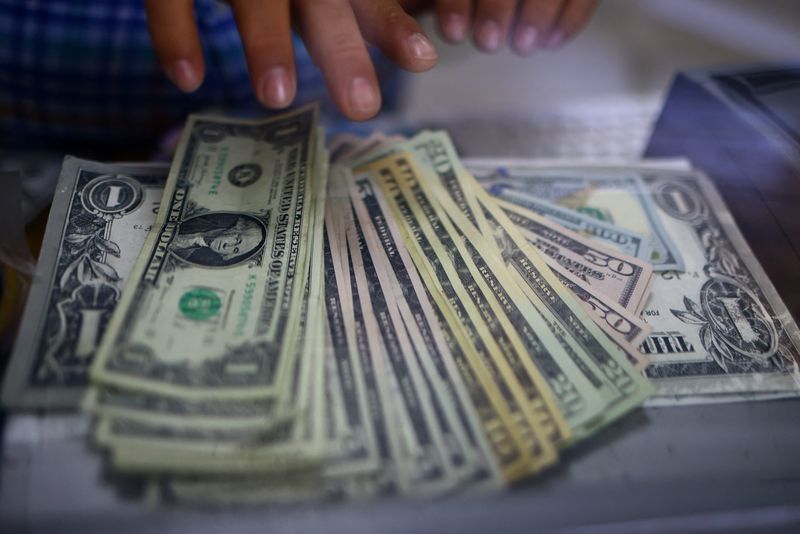 Dollar retreats after China deflation unleashes drive into risk assets