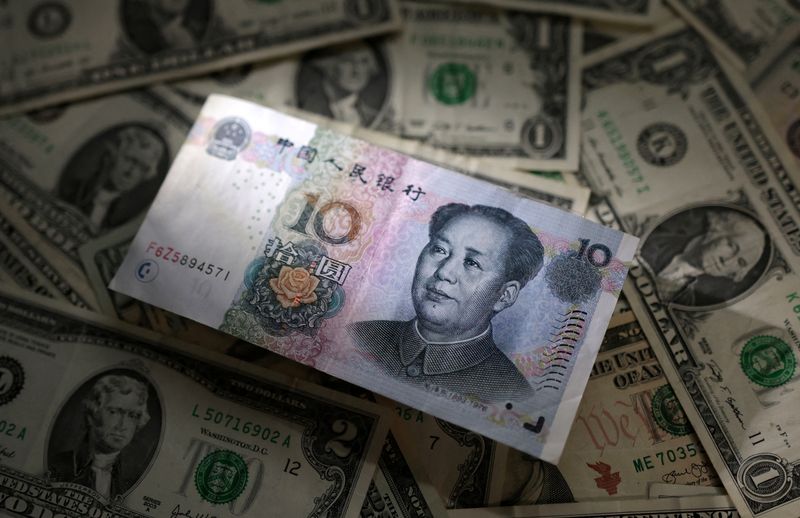 Yuan falls to 9-month low after China rate cut, sterling rises after jobs data