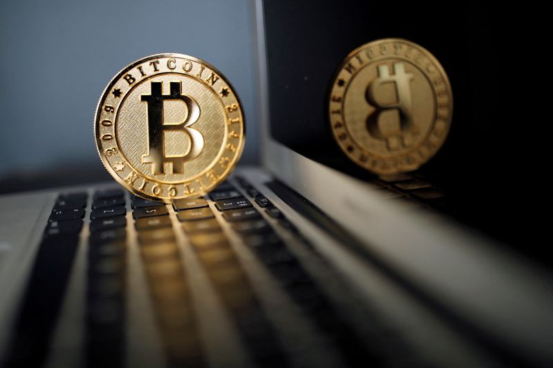 Bitcoin hits three-month high, buoying crypto stocks