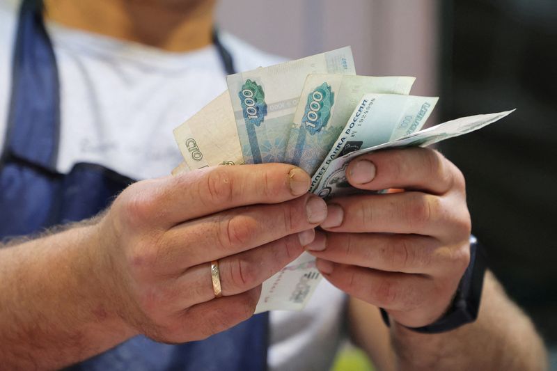 Rouble recovers after slump to seven-week low past 101 vs dollar
