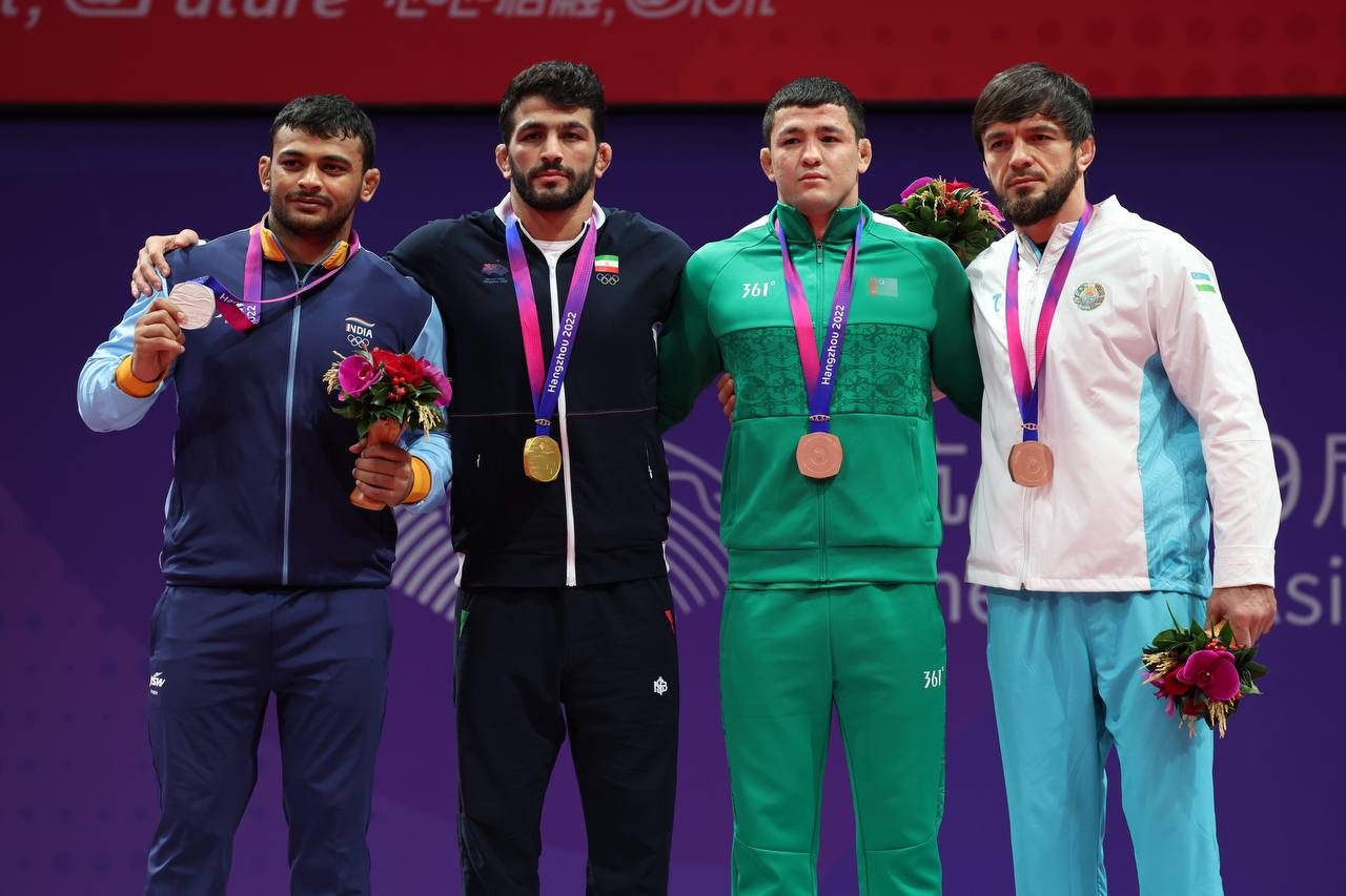 عکس| حسن یزدانی و طلایی برای فراموش کردن تیلور