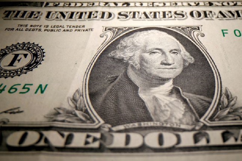 Dollar retreats in thin volumes; Fed monetary policy in focus